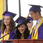 From left, Arlene Law and Elizabeth Sweet join Liam Payne  three of Sequim Highs seven valedictorians  in giving a group valedictory address at the SHS Class of 2019 graduation ceremony on June 7. Sequim Gazette photo by Michael Dashiell