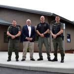 The new Public Safety and Justice Center for the Jamestown SKlallam Tribe offers bigger space for tribal officers Patrick Carter, left, Police Chief Rory Kallappa and Jason Robbins. Ron Allen, Jamestown tribal chairman and CEO, second from left, said when people come here whether for a case or any regard with a judicial or public safety matter, they know theyre walking into a place that reflects professionalism and integrity of a quality law enforcement system. Sequim Gazette photo by Matthew Nash