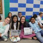 Greywolf Elementary students celebrate graduation at the schools Fifth Grade Moving On ceremony on June 18. They include (back row, from left) Raimy Brewer, Laila Sundin, Lincoln Forrest and Hunter Tennell, and Penny Edwards, Nadyia Bess, Azlynn Judd and Grillien Morrill Jr. Photo by Darcy Lamb