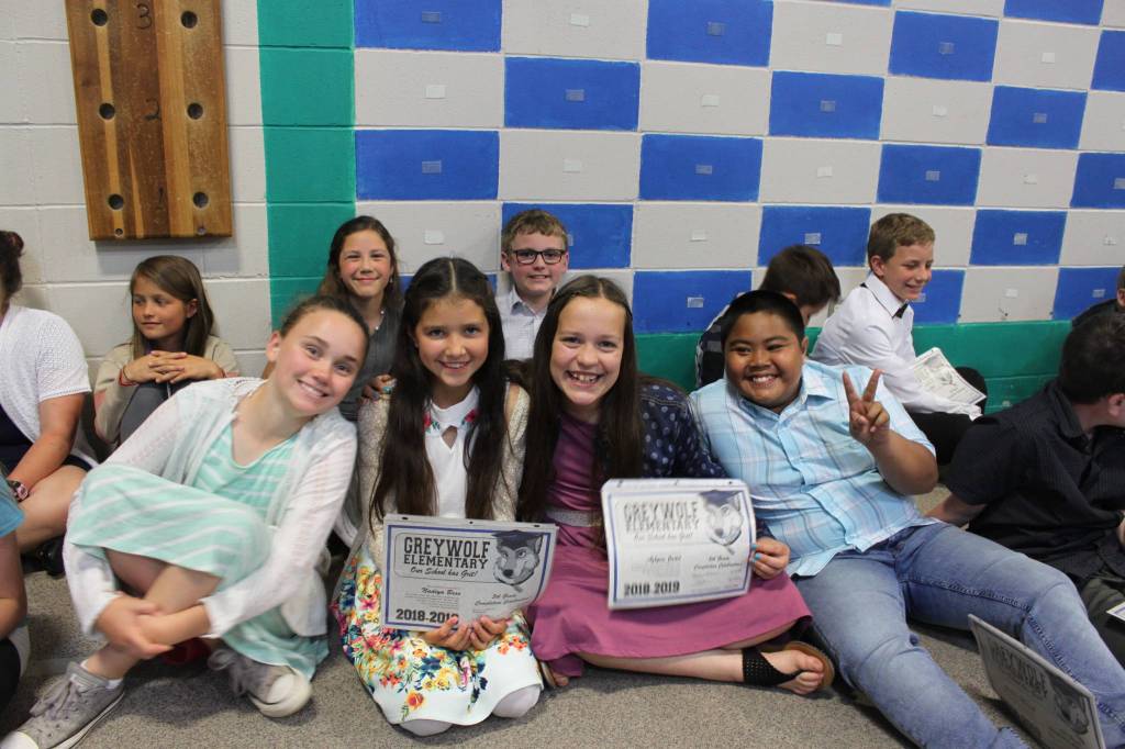 Greywolf Elementary students celebrate graduation at the schools Fifth Grade Moving On ceremony on June 18. They include (back row, from left) Raimy Brewer, Laila Sundin, Lincoln Forrest and Hunter Tennell, and Penny Edwards, Nadyia Bess, Azlynn Judd and Grillien Morrill Jr. Photo by Darcy Lamb