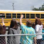 Sequim schools staff wave goodbye to students on the final day of school, June 19. Sequim Gazette photo by Conor Dowley