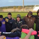 Head coach Dave Brasher talks with his Sequim High players in an April 26 match against North Mason. This years Wolves went undefeated in league play for the first time in the programs history, placing second at districts. Sequim Gazette file photo by Matthew Nash