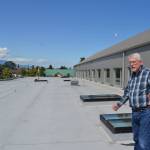 David Garlington, Sequim public works director, shows where 150 solar panels will be placed on the Sequim Civic Centers roof tentatively sometime this year. In June, Sequim city councilors committed to paying for the panels in an effort to promote solar energy. Sequim Gazette photo by Matthew Nash
