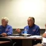 Mike Gawley and James Barnfather, fire commissioners for Clallam County Fire District 3, and Fire Chief Ben Andrews listen in on a discussion about the possibility of renewing the districts 10-year EMS levy, which accounts for 25 percent of its annual budget. Sequim Gazette photo by Matthew Nash