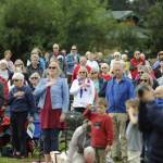 Concert-goers join in the singing of The Star Spangled Banner at the Sequim City Bands July 4 concert. Sequim Gazette photo by Michael Dashiell