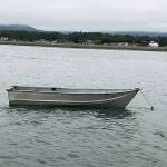 After falling from this small aluminum dinghy, a man was rescued by John Robert Labbe and his family and Sue Cram and Dick Neil in Dungeness Bay on July 4. The boat also had a small outboard motor that Labbe detached and stowed away to make it safer and easier to transport back to John Wayne Marina. Submitted photo by Dick Neil