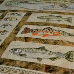 A newer technique for Karen Clatanoff includes using crayons to color sections of her quilts and embroider around them to accent the colors. Sequim Gazette photo by Matthew Nash