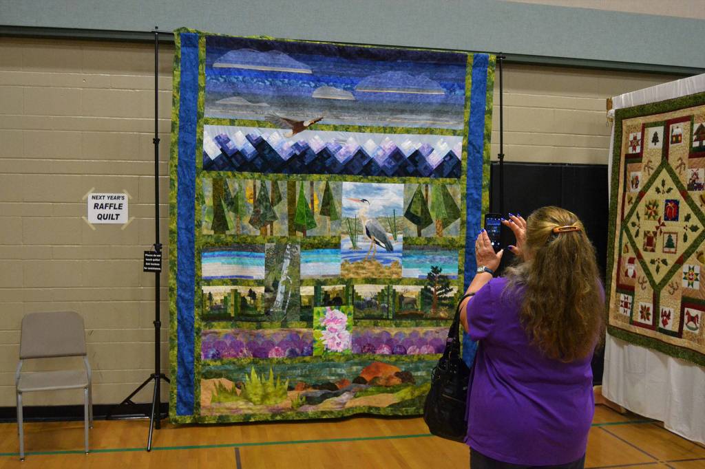 Raffle tickets remain available for the Sunbonnet Sue Quilt Clubs annual raffle quilt called NorthWest Splendors. The show runs July 19-21 at the Sequim Middle School. Sequim Gazette file photo by Matthew Nash