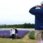 Just prior to the start of the Washington Lavender Festival (which runs July 12-21), Valerie, Brady and Eric Largen of Huntsville, Ala., take a picture in a lavender field last week at Washington Lavender Farm. The family said they are on vacation and had to stop in a lavender field. Sequim Gazette photo by Matthew Nash