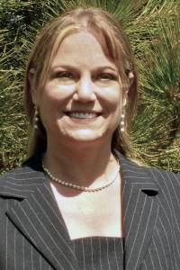 Nicole Patrick, the new Development Manager at the Olympic Peninsula Humane Society. Among her other responsibilities, Patrick will be helping lead a funding campaign to build new offices and a new Kitty City to replace the mobile coaches on the property. Photo submitted by OPHS.