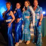 ABBAs hit music comes to life for three weeks in Mamma Mia! starring, from left, Angela Poynter (as Tanya), Jennifer Saul (Rosie), Cecie McClelland (Donna), and John Lorentzen (Sam). Photo by Bob Spink