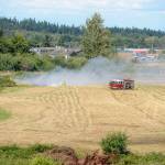 A brush fire near East Hammond Street could be seen by drivers from South Sequim Avenue on July 19. Sequim Gazette photo by Matthew Nash