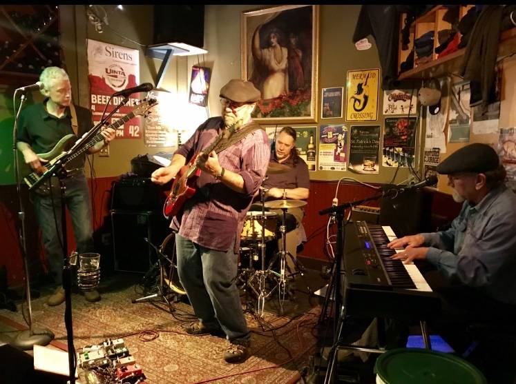 Kayohti brings upbeat dance music to Olympic Theatre Arts for the Aug. 2 First Friday event. Pictured, from left, are Jim Charlier (bass, vocals), Mike Pace (guitar, vocals), Terry Smith (drums) and Mark Schecter (keyboard, vocals). Submitted photo