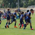 Members of the Storm King Cyclones U13-U14 team celebrate a late goal scored against the TCRT Alliance. They went on to win that match 4-3 in a close game that featured four late goals, then faced TCRT again in the division final, winning the championship in a 5-2 match. Sequim Gazette photo by Conor Dowley.