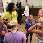 Boys & Girls Club campers meet with Seattle Storm forward Alysha Clark during a recent visit to Swedish Hospital.