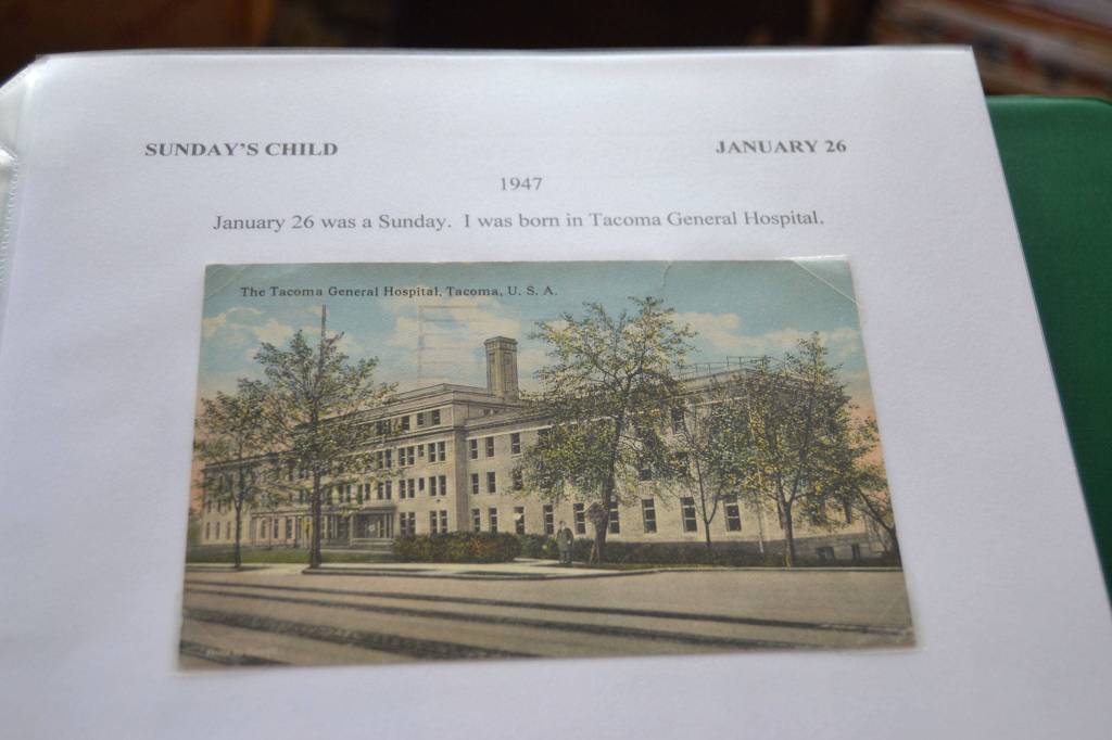 Cathie Osborne has compiled a collection of stamps centered around her birthday. She looks for postage issued on her birthday through the years. Sequim Gazette photo by Matthew Nash