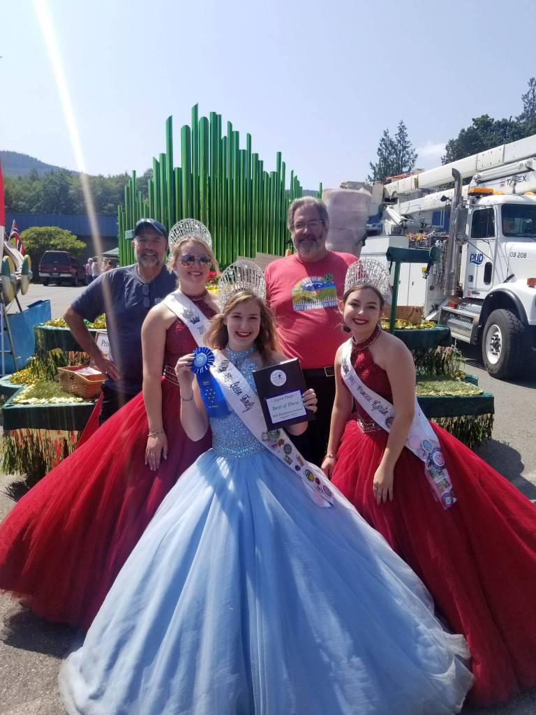 This summer has been full of accolades for the Sequim Irrigation Festival float and its royalty and volunteers. They most recently won Best of Show at the Joyce Daze Wild Blackberry Festival on Aug. 3. Pictured from left, are Jim Stoffer, volunteer, Princess Shelby Wells, Queen Emily Silva, float designer Guy Horton, and Princess Kjirstin Foresman. Photo courtesy Jim Stoffer/Sequim Irrigation Festival