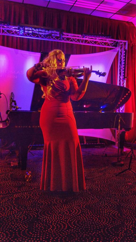 Along with the piano, Jennifer Thomas plays the violin for her upcoming shows in Sequim and Seattle. In recent years, Thomas music averages at least 1 million plays per week on Pandora. Photo courtesy of Will Thomas