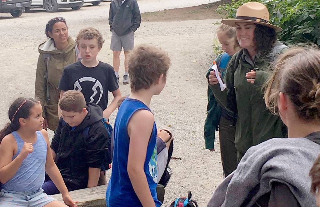 Junior Rangers spend some time with park ranger Molly Sullivan, far right. Submitted photo