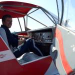 Jacob Kirschbaum, a University of North Dakota aviation student from Silverdale, readies to fly a CallAir A-2. He is one of several students that works at the Port Townsend Aero Museum learning about aircraft. Sequim Gazette photo by Matthew Nash