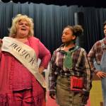 The Mayor, Kenzie Camp, comes up with an idea to stop the dragon as Jenkins (Indi Mixon) and Father (Ashton Drew) listen in during The Reluctant Dragon. Sequim Gazette photo by Matthew Nash