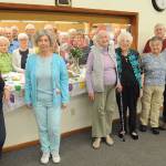 Betty Longshore (in front, third from left) celebrates turning 100 with members of her Sequim Duplicate Bridge Club last week. The club meets Mondays and Fridays with games starting at 12:30 p.m., at the Masonic Lodge, 700 South Fifth Ave. Sequim Gazette photo by Michael Dashiell
