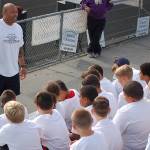 Wayne Hunter addresses the 50 attendees of a 7th and 8th grade football camp on Aug. 24 put on by the Sequim Middle School football coaching staff. Hunters talk focused not just on football, but on always putting in the effort to seize opportunities in life, not just taking them for granted. Sequim Gazette photo by Conor Dowley