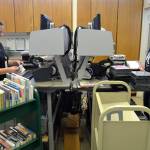 Annie Brooker, left, and Jessica Raivo, customer service specialists at the Sequim Library, check in books and movies recently returned or transferred to the branch. Effective Sept. 1, library staff stop late fines and fees for patrons to promote accessibility. Brooker said people shouldnt be ashamed because staff often have late fees or fines because they see all the materials coming in and something new always catches their interest. Sequim Gazette photo by Matthew Nash