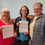 The Beta Nu Chapter of Delta Kappa Gamma recently awarded two grants to help students at Helen Haller Elementary. Pictured, from left, are reading paraeducator Rhonda Cays, reading specialist Betsy Smith and Beta Nu representative Louise Potter. Submitted photo