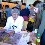 Kris Ecklund, left, discusses her concerns about about accessibility to North Fifth Avenue and medical plazas with Katie Cole, Sequim associate engineer, on Aug. 28.