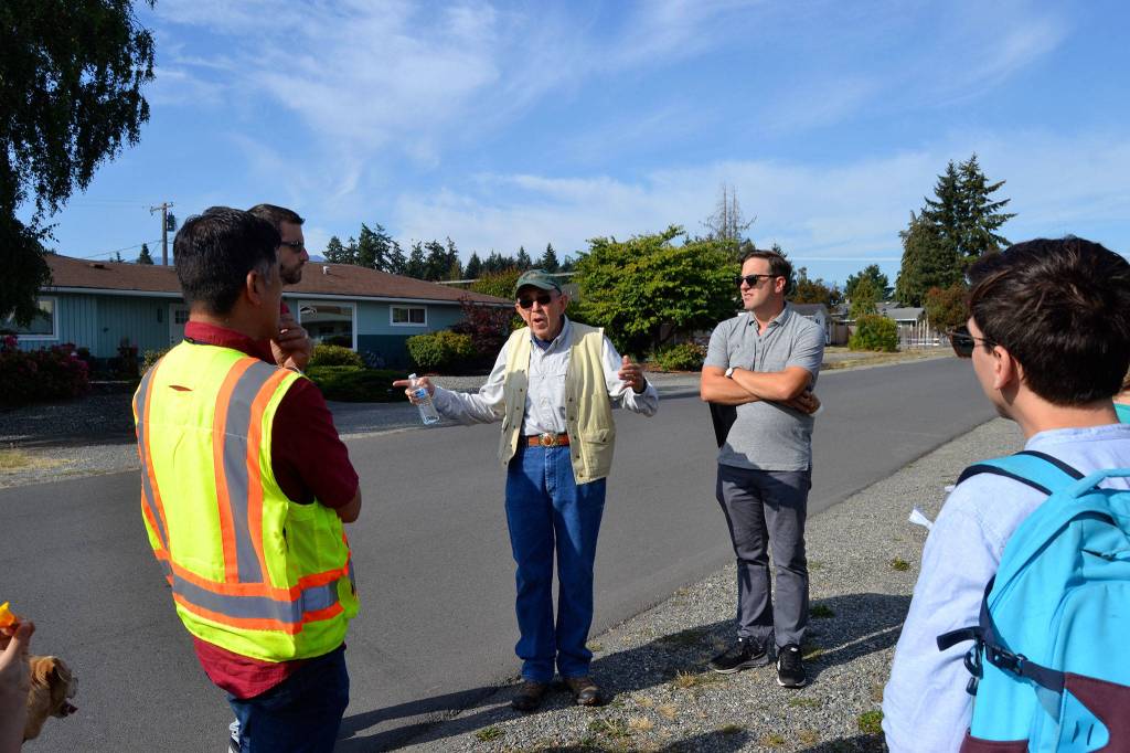 John Viada of Sequim, center, talks with consultants on Aug. 29 about some of the possible issues along Prairie Street and other downtown streets. Im interested in planning process, he said. I think theyre going to need to do something. Sequim Gazette photo by Matthew Nash
