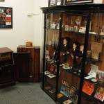 Left, a collection of Beatles memorabilia on display in the KSQM community room, along with classic radios and other musical memorabilia. Collection owner George Dooley, who hosts Doctor Dees Roots of Rock Friday nights at 8:30 p.m. on KSQM, has what he calls a significant rock and roll memorabilia collection that hes slowly been rotating through displays at the station. Sequim Gazette photo by Conor Dowley