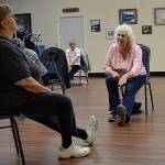 Margaret Cox, Shipley Center board president, leads a balance exercise class on Sept. 6 for center members like Sandee Freeman who said the class helps build your core. Its a fabulous class, Freeman said. Coxs open house returns on Sept. 12 from 1-4 p.m. so the community can get a taste for the centers various activities. Sequim Gazette photo by Matthew Nash