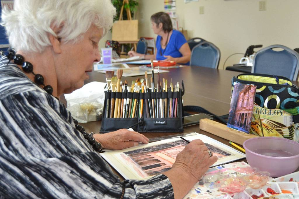 Watercolor remains a mainstay at the Shipley Center for painters like Melinda Griffith, left, and Lori Rice. They paint on Thursdays with teacher Judy Priest.