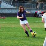 Abby Schroeder, center, scores what was ultimately the winning goal late in the second half of a 2-1 win for Sequim over Klahowya on Sept. 10. Schroeder scored both Sequim goals in the game, both in the second half, and after the game credited her teammates for stepping up and helping her find room to work with in a crowded defense on both goals. Sequim Gazette photo by Conor Dowley