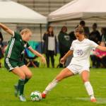 Sequims Jessica Dietzman, center, looks to make a play on the ball as Port Angeles Jada Cargo (20) looks for teammates Bailee Larson (10 and Teagan Clark (4) in the first half of an Olympic League match-up in Port Angeles on Sept. 12. The Roughriders won, 4-1. Sequim Gazette photo by Michael Dashiell