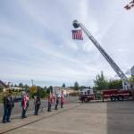 American Legion Riders present colors at the Port Angeles Fire Department on the 18th anniversary of the 9/11 terrorist attacks Wednesday. (Jesse Major/Peninsula Daily News)