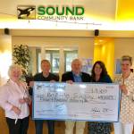 Sound Community Bank recently presents a $4,000 contribution to the Port Angeles Symphony for its Adventures in Music (AIM) program. Pictured are, from left, Symphony member Marie Meyers, AIMs Al Harris, Symphony music director and conductor Jonathan Pasternack, Sound hub manager Shelli Robb-Kahler and retail manager Laurie Szczepczynski. Photo courtesy of Port Angeles Symphony