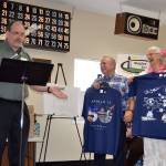 Michael Smith, executive director of Shipley Center, recognizes retired U.S. Air Force Col. Joey Lazzaro and his wife Mahina, who spoke in July at the center about Lazzaros time with the mission control team that oversaw operations during Apollo 11s landmark lunar landing 50 years ago. Below, Shipley Center members enjoy some time creating fiber arts in the Arts and Crafts room during the Open House on Sept. 12. Sequim Gazette photos by Matthew Nash