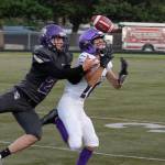 Garrett Hoesel tries to haul in a pass while holding off North Kitsaps Colton Bower. Hoesel lead the Wolves in receptions with five catches for 56 yards. Photo courtesy of Mark Krulish/Olympic Peninsula Newsgroup