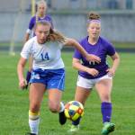Sequims Alexis Smith, right, defends against Bremertons Claire Warthen in the first half of the Wolves 4-1 win at Sequim on Sept. 17. Sequim Gazette photo by Michael Dashiell
