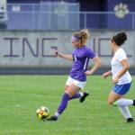 Sequim defender Amara Sayer, left, clears the ball from the Wolves end of the field as Bremertons Ammaya Robinette pursues play, in the first half of an Olympic League match against Bremerton on Sept. 17. Sequim Gazette photo by Michael Dashiell