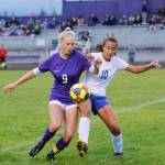 Sequims Eden Johnson, left, vies for the ball with Bremertons Neveah Jackman in an Olympic League match on Sept. 17. Sequim won, 4-1. Sequim Gazette photo by Michael Dashiell