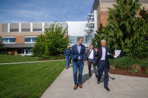 U.S. Rep. Derek Kilmer, left, and Olympic Medical Center CEO Eric Lewis walk through OMCs Sequim Campus in May. File photo by Jesse Major/Peninsula Daily News