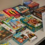 A selection of games available for anyone to play at a recent Meeples of Sequim gathering on Sept. 18. Travis Britten said that he and his wife Echo Cox try to bring a variety of games from week to week, and other regulars bring various games as well. Sequim Gazette photo by Conor Dowley