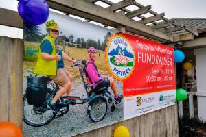 Milestone: Wheelers, advocates raise nearly $1,600 for program