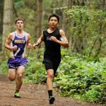 Sequims Koda Robinson, right, races to a 13th place finish  tops on the team  in the Wolves home meet Sept. 25 against Port Angeles and North Kitsap. Sequim Gazette photo by Michael Dashiell