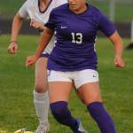 Natalya James fights through midfield in the first half of Sequims home match against North Kitsap on Sept. 24. James was a big part of Sequims successes in the match, winning the ball back in midfield several times to cut off potentially dangerous Vikings attacks or to set up attacks for the Wolves.