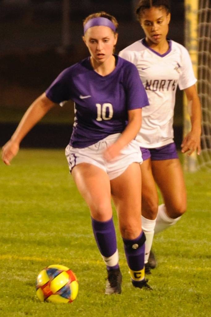 Defender Gabby Happe (10) steps up on the ball after winning it back from North Kitsap forward Emma Harper in the first half of the Wolves loss on penalty kicks. Happe was one of the standout performers for the Wolves against the Vikings, especially in the second half when the team adjusted how they were defending against North Kitsaps direct attacking play. Sequim Gazette photos by Conor Dowley