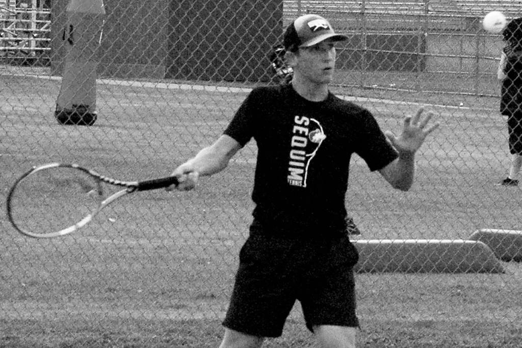 Nico Zingaro returns a serve in the second set of his match against North Kitsaps Chris Schuchart on Sept. 25, which he would win 6-2 to win the match. Zingaro was Sequims only undefeated player on the week, not dropping a single set in three matches. Sequim Gazette photo by Conor Dowley